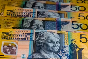Australian fifty dollar notes fanned out on a table